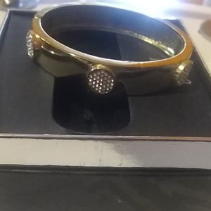 INC gold hinged bangle with sparkles